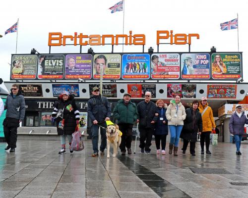 A group of vision impaired walkers from Vision Norfolk step out for a walk on Great Yarmouth seafront sm