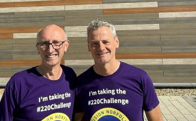 Vision impaired runner Chris Waller right with guide Ade Dyde