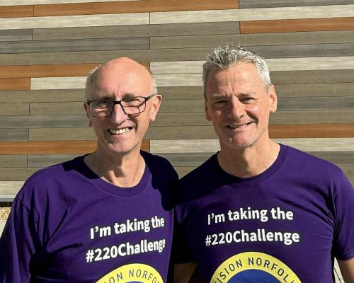 Vision impaired runner Chris Waller right with guide Ade Dyde