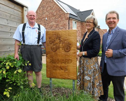 Artist Carl Preston left with Maggie and Tony Abel of Abel Homes at the unveiling in Gressenhall sm