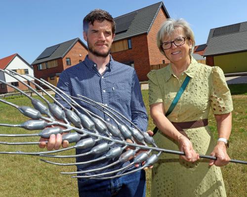 Artist blacksmith Toby Winterbourn and Maggie Abel of Abel Homes at Cygnet Rise in Swaffham sm