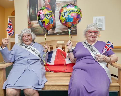 Centenarians Pattie Knopp left and Marion Bubs Wilkinson celebrate the 20th birthday of Lloyd Court sm