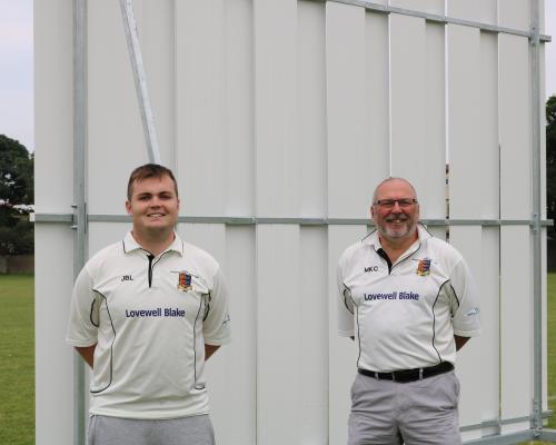 GYCC chairman Mark Chapman right and second team captain James Ludlam with one of the new sight screens