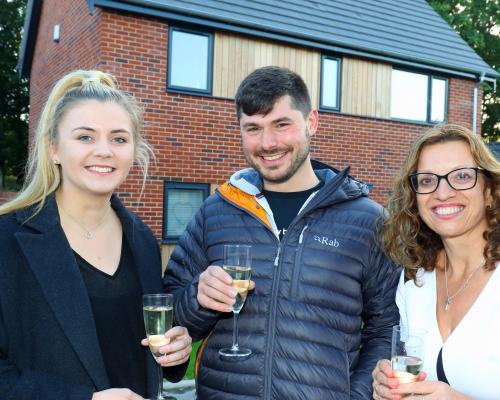 Homebuyers Anna Jolly and Dan Balls with Abel Homes sales and marketing manager Clare Cornish right