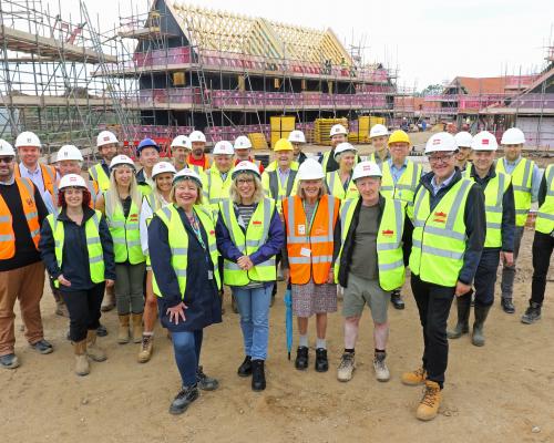 Housing officials inspect progress at the site of 19 new net carbon homes in Northrepps 1 sm