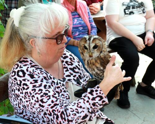 Kelci Batch holds a tawny owl