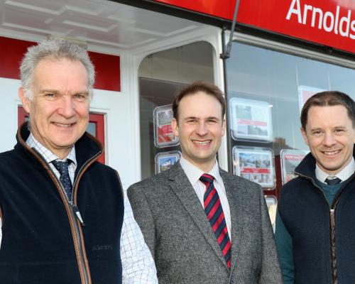 New rural practice surveyor Jamie Manners centre with Arnolds Keys agricultural partners Simon Evans left and Tom Corfield sm