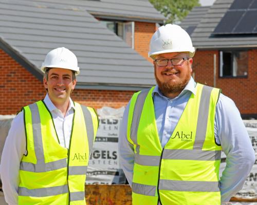 Pride in the Job winner Tim Walsingham right and Abel Homes managing director Paul LeGrice sm