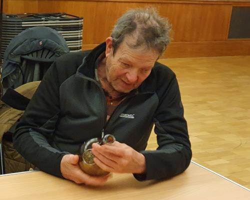 Stephen Seekings handles a replica of a wine bottle from the Gloucester at Norwich Castle Museum 1