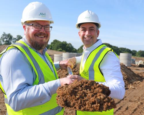 Tim Walsingham left and Paul LeGrice cut the first sod at Swanton Road Dereham sm