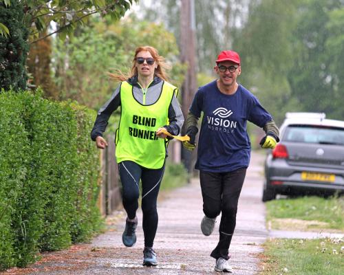 Visually impaired runner Rachael Andrews training for the Sandringham 5K with guide Rob Collins sm