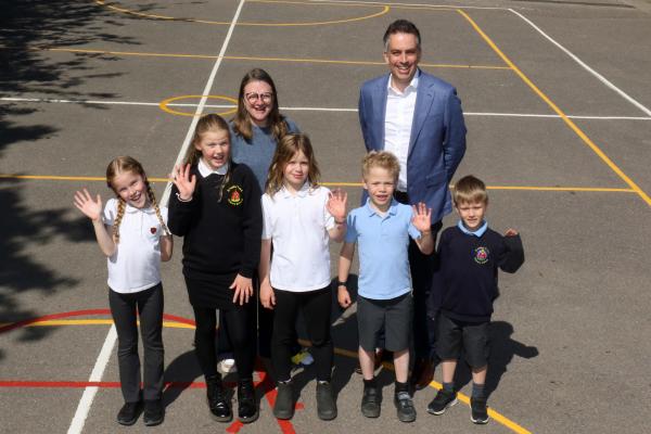 Katherine Wilson and Paul LeGrice with some of the children from St Faiths Primary School sm
