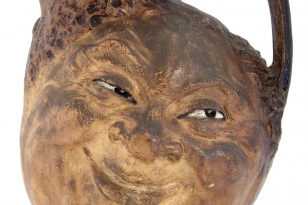 Martinware double sided face jug estimate 1200 1500