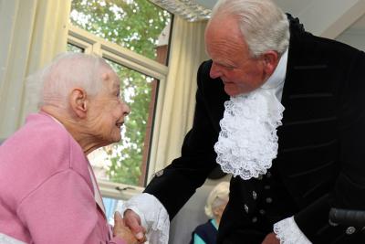 A resident at Thomas Tawell House meets High Sheriff of Norfolk Charles Wattt sm
