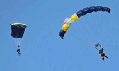 Allan Saunders and Louise Hillman about to touch down at the end of their charity skydive
