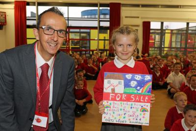 Arnolds Keys Aylsham manager Paul Sullivan with Bure Valley School pupil Erin Reeve 1