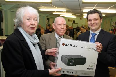 Barry Cooke of Arnolds Keys right presents the projector to Cringleford Historical Society chairman David Welch and secretary Pat Wagstaff