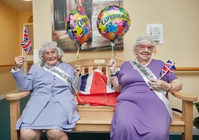 Centenarians Pattie Knopp left and Marion Bubs Wilkinson celebrate the 20th birthday of Lloyd Court sm