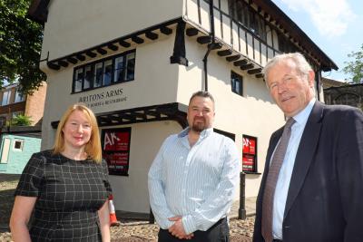 Chef Richard Ellis centre with Hiedi Collis of Arnolds Keys and Paul Watson of the Norwich Preservation Trust sm