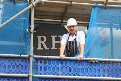 Chef Roger Hickman inspects the building work at his Norwich restaurant sm