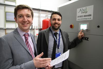 Chris Abel of Abel Energy left and Sel Akman of Jeesal commission the new biomass boiler at Cawston Park