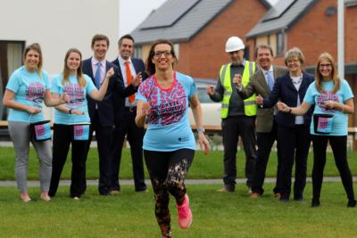 Clare Cornish of Abel Homes trains for the London Marathon cheered on by colleagues sm