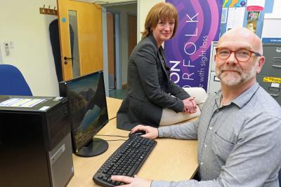 Clive Evans of the NNAB and Jackie Wells of ESE Direct with one of the donated computers sm