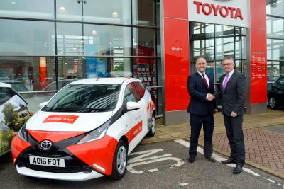 Clive Hedges right of Arnolds Keys and Damian Pavy of Dingles Toyota with one of the new Toyota Aygos