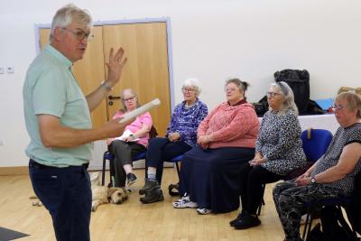 Conductor James Fowler leads a rehearsal of the Vision Norfolk Norwich choir sm