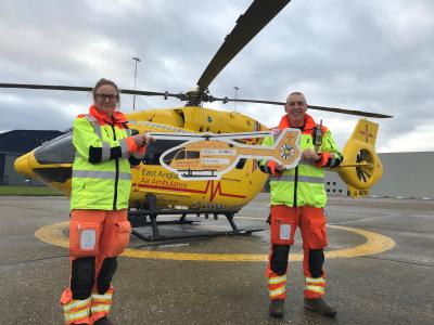 EAAA crew members Dr Joanna Stevens and CCP Rod Wells celebrate the 10000 donation from Abel Homes