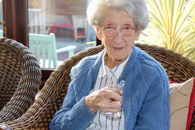 Ellen Lincoln celebrates her 104th birthday with a glass of sherry sm