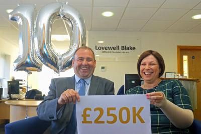 Gary Flatt and Mel Wright of Lovewell Blake celebrate the 10th anniversary of the LB150 Fund which has broken through the 250000 mark