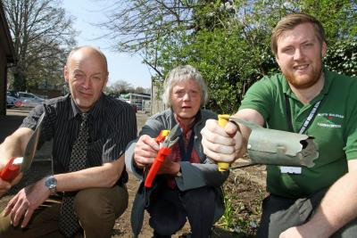 Guerrilla Gardening NWHS teacher Simon Weal Marion Lane of North Walsham in Bloom and Ben Youngs of North Walsham Gard