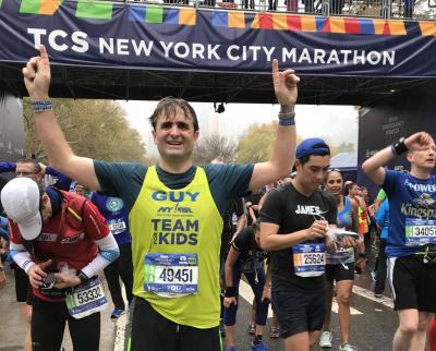 Guy Gowing crosses the line afer completing the New York marathon 1