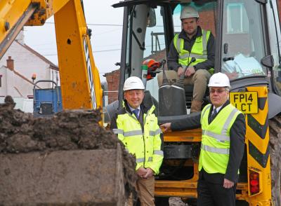 James Ollington cuts the first sod at Briston watched by Paul Pitcher left and Darryl Cox