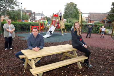 Jenna Gould left Will Hunter Rowe and Katie Docherty at the new outdoor play area and garden at St James Lodge sm