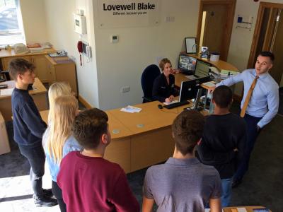 Lovewell Blake staff Vicki Harrow and Daniel Applegate welcome some of the Lowestoft College students to the firms Lowestoft office