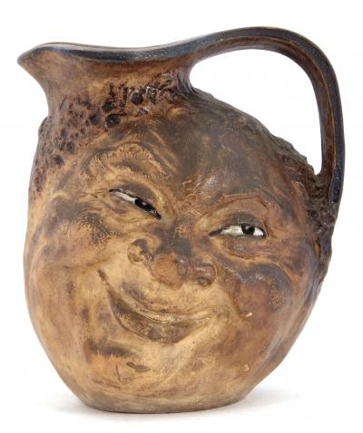 Martinware double sided face jug estimate 1200 1500