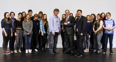 Mason Burrell presents the Arnolds Keys Cup for Drama and Performance to Paston College
