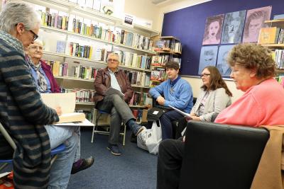 Members of the Cromer Audio Book Club discussing their latest book at Cromer Library