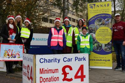 NNAB and Marsh volunteers staffing the charity Christmas car park