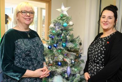 NNAB chief executive Gina Dormer left and Thomas Tawell House manager Sam Capper get ready to welcome Christmas guests to the home