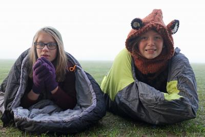 NWHS students Holly Edens left and Amelia Hennigan get ready to spend a freezing night under the stars