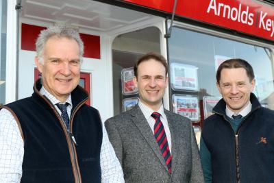 New rural practice surveyor Jamie Manners centre with Arnolds Keys agricultural partners Simon Evans left and Tom Corfield sm