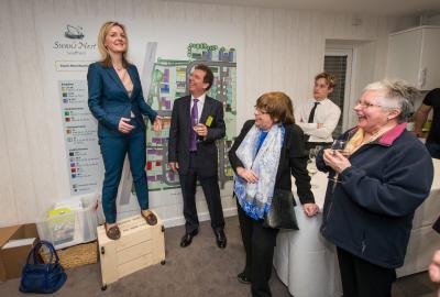 On her soapbox Liz Truss launches the show home at Swans Nest watched by Tony Abel and guests