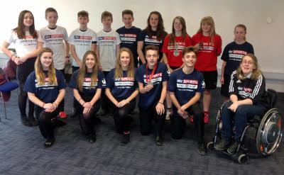 Paralympian Fran Williamson front right with NWHS students