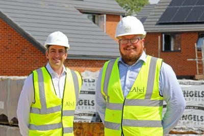 Pride in the Job winner Tim Walsingham right and Abel Homes managing director Paul LeGrice sm