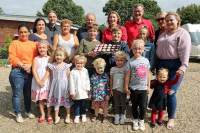Residents at Brooks Green celebrate the sites tenth annivesary with representatives from Broadland Housing Group sm
