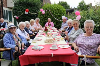 Residents of Norwich Housing Societys Eleanor Road complex enjoying their Strawberry Tea