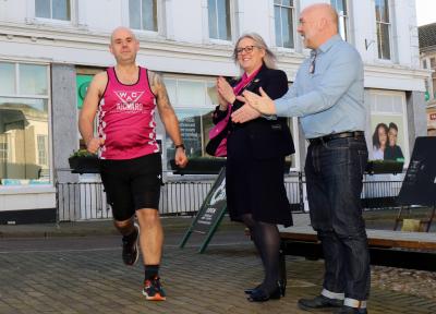 Richard Morris is cheered on by colleague Claire Currie and Clive Evans of Vision Norfolk sm